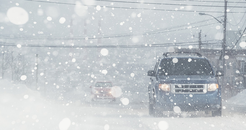 car on road on a snowy day