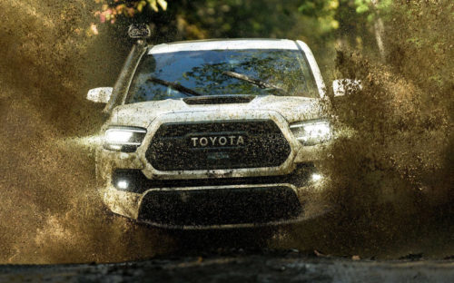 2020 Toyota Tacoma barreling through mud
