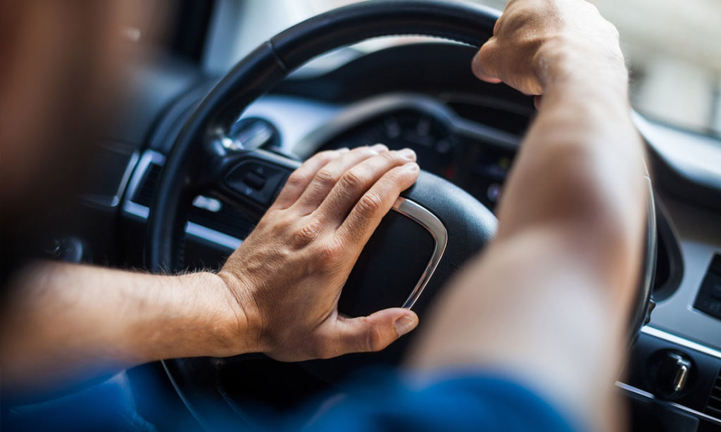 Hands on steering wheel