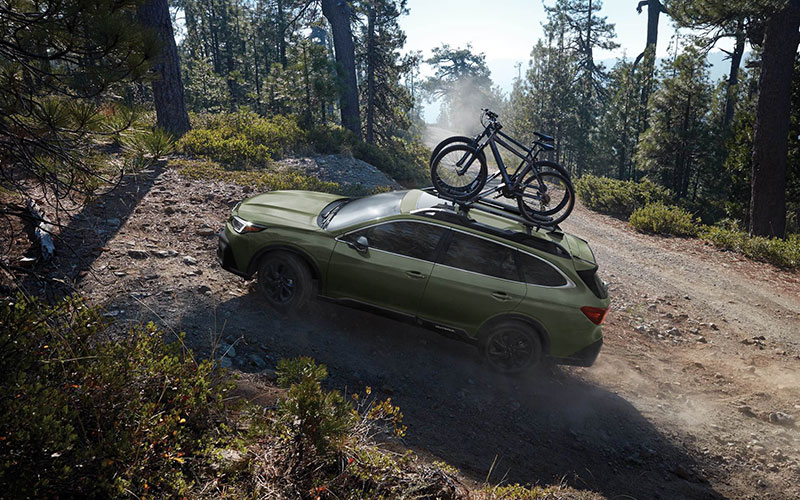 Outback Subaru on dirt road