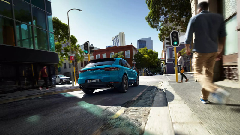 2020 Porsche Macan driving in the city