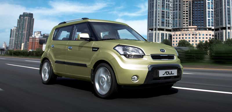 Green Kia Soul on Road