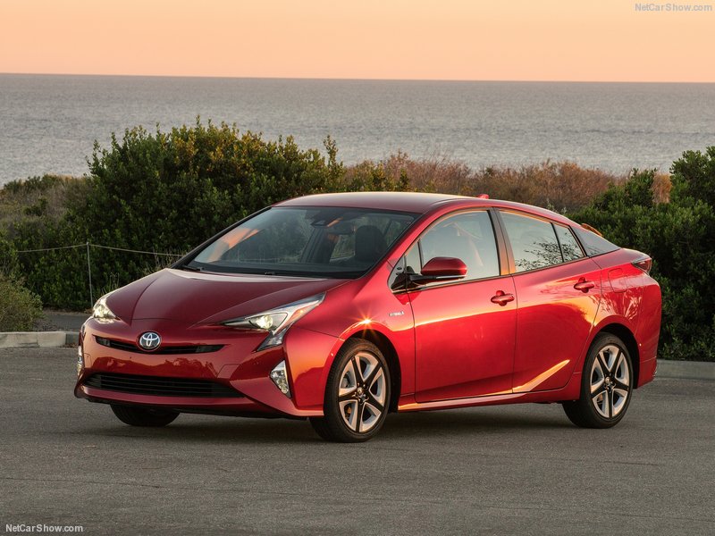 red Toyota Prius parked on mountain