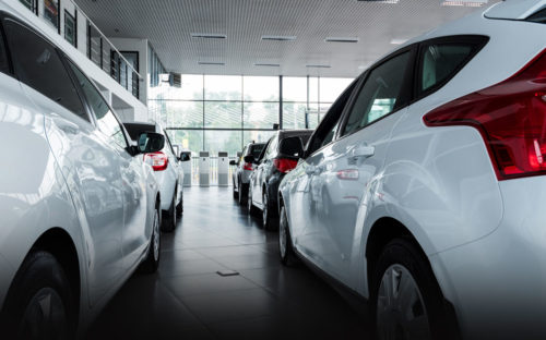 Various cars in a showroom - Car Buying During the Coronavirus Pandemic