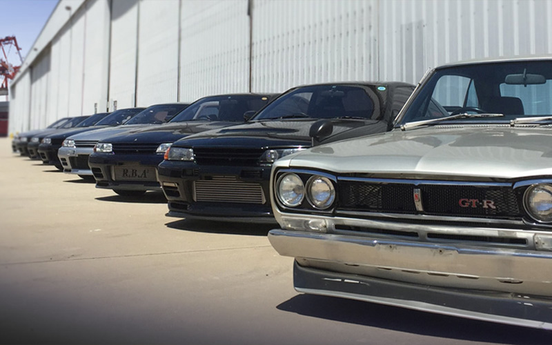 JDM cars lined up waiting for export - topranktrade.jp
