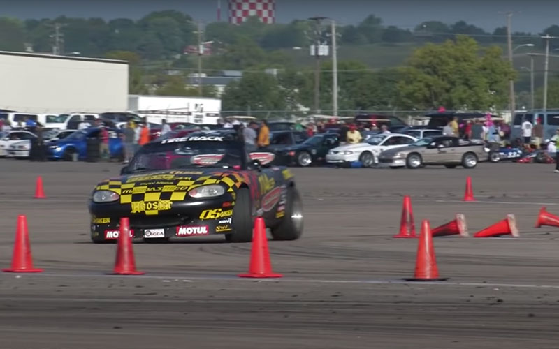 Car racing through an Autocross course - RoadandTrack on YouTube.com