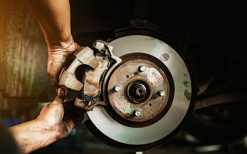 Removing brake caliper