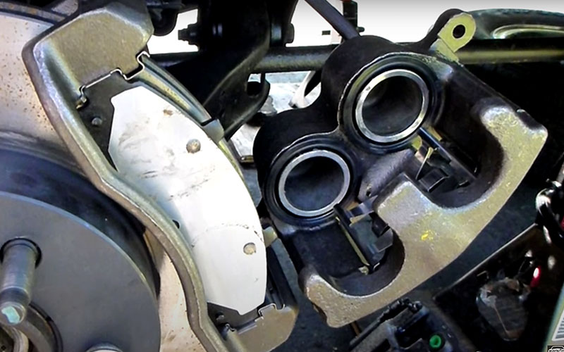 Brake pad and caliper - ChrisFix on YouTube.com
