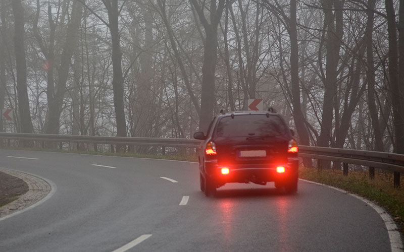 Driver using vehicle's brakes