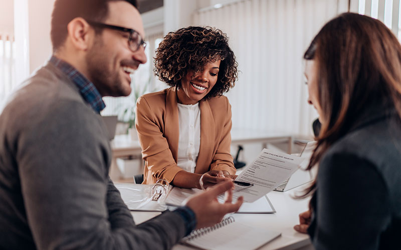 Couple receiving paperwork