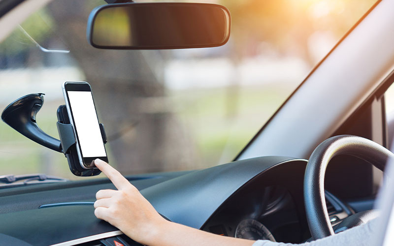 Phone in a windshield phone mount