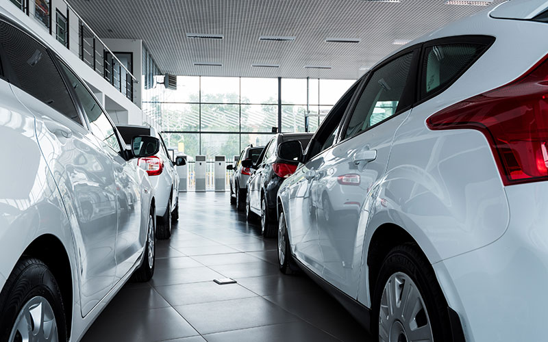 Vehicles in a showroom Vehicles in a showroom