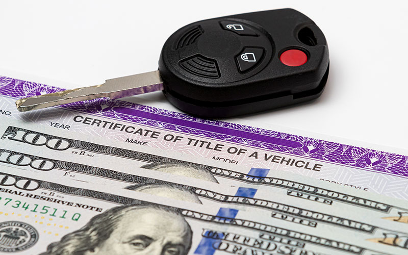 Key, title, and cash for a vehicle Key, title, and cash for a vehicle
