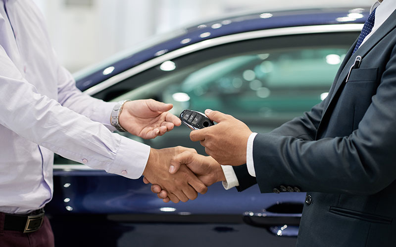 Customer and Salesperson making a deal