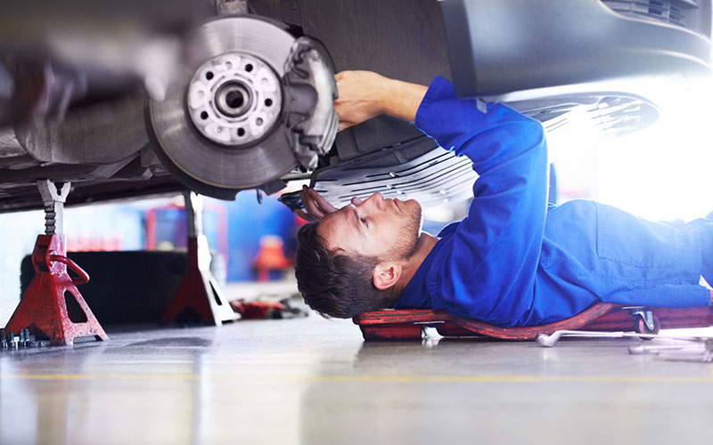 Mechanic working on a car