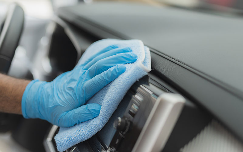 Detailing a car using a microfiber cloth