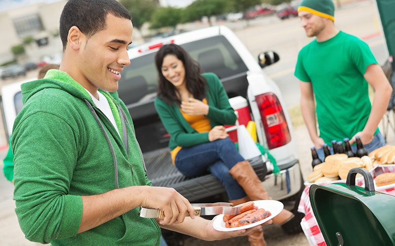 Group of people tailgating