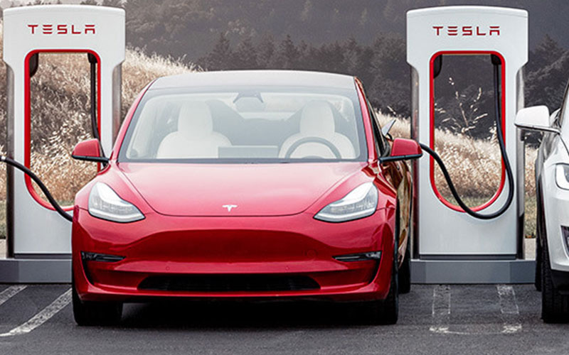 Tesla Model 3 at Supercharger Station - tesla.com