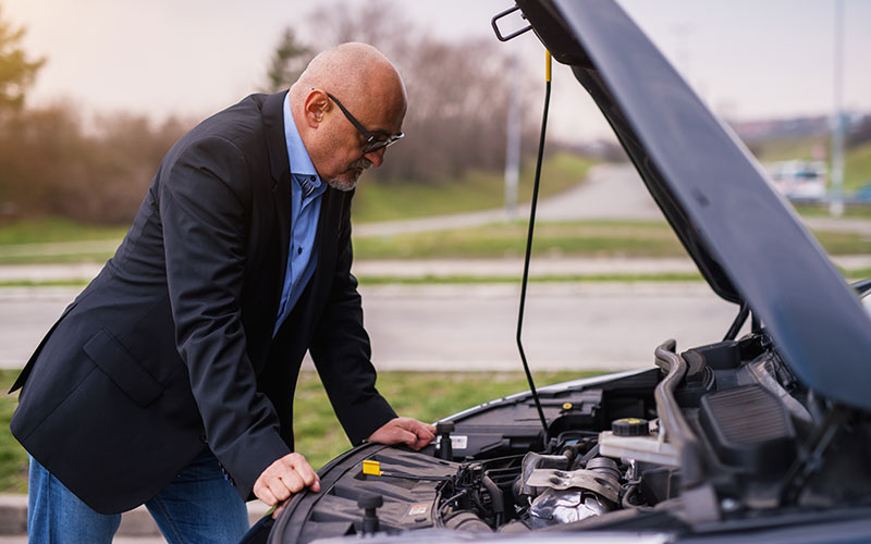 Looking under the hood of a vehicle