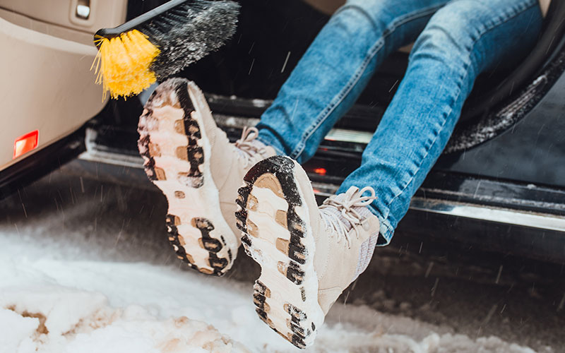 Getting out of a car in snow boots