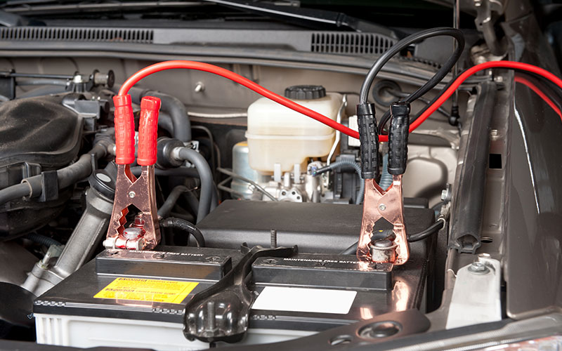 Jumper cables on a battery