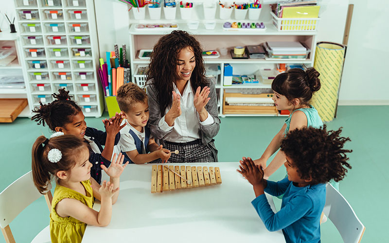 Young children with a teacher