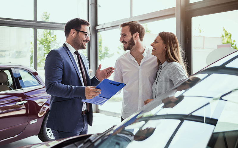 Couple buying a car
