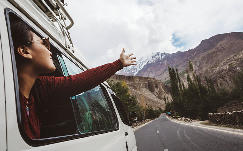 Passenger on a road trip