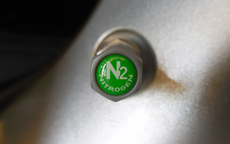 Nitrogen tire valve cap