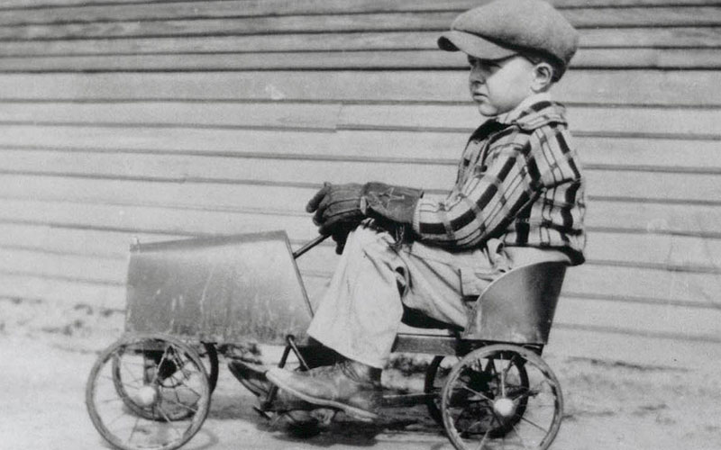Young Shelby on a tractor - shelby.com