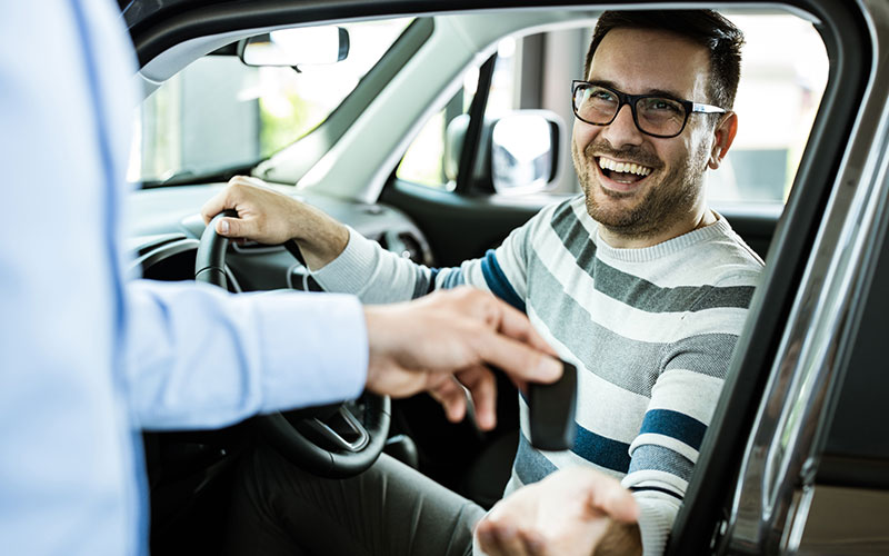 Receiving keys to purchased vehicle
