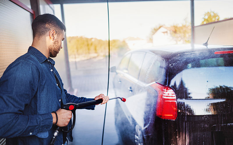 Man washing his car