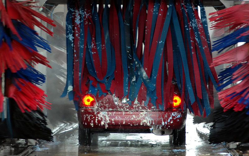 Vehicle going through a car wash