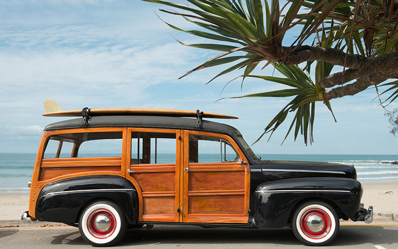 Woody car on the beach