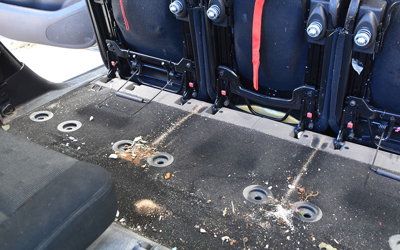 Debris build-up under car seats