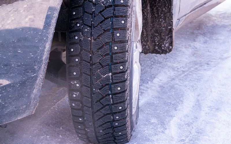 Car with studded tires Car with studded tires