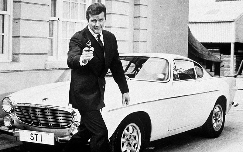 Roger Moore with a Volvo P1800 - media.volvocars.com
