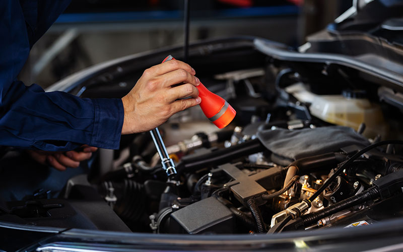 Looking at the engine bay with a flashlight