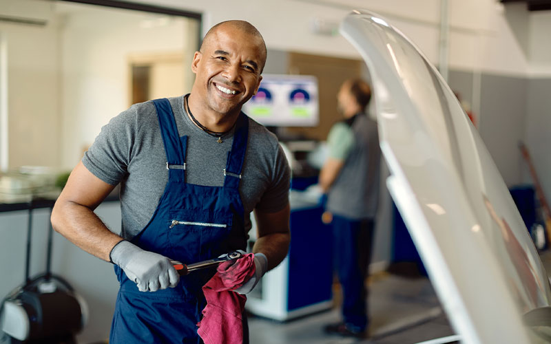 Professional mechanic working on a car