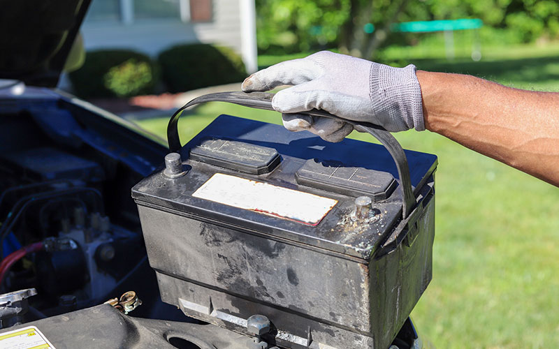 Old car battery removed