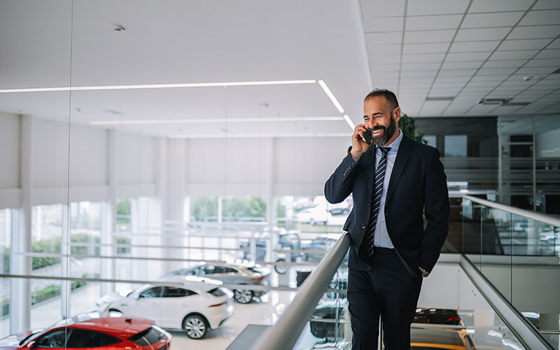 Salesman in dealership Salesman in dealership
