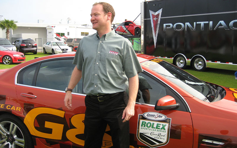 Tommy Kendall in front of 2008 Pontiac G8 - CC-BY-SA on Wikimedia.org