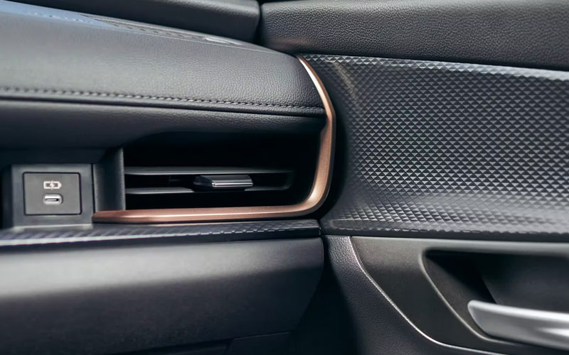 2024 Toyota Grand Highlander bronze-colored dash - toyota.com