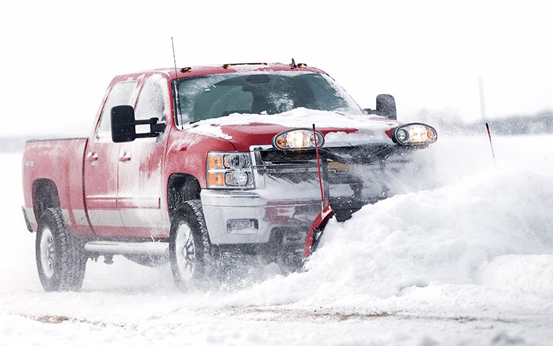 Chevrolet Pick-up Truck Plowing