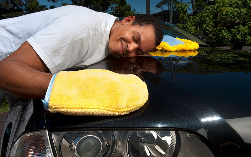 Man taking care of his car