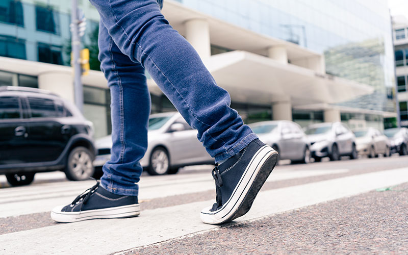 Pedestrian crossing the street Pedestrian crossing the street