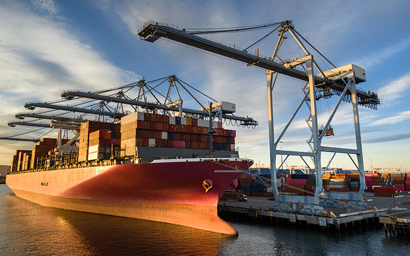 Docked cargo ship loaded with containers Docked cargo ship loaded with containers