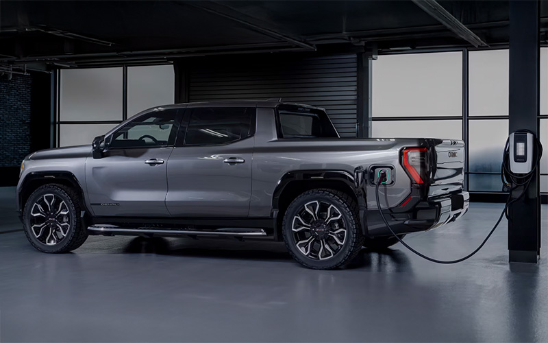 GMC Sierra EV Denali Edition Side Exterior Charging - gmc.com