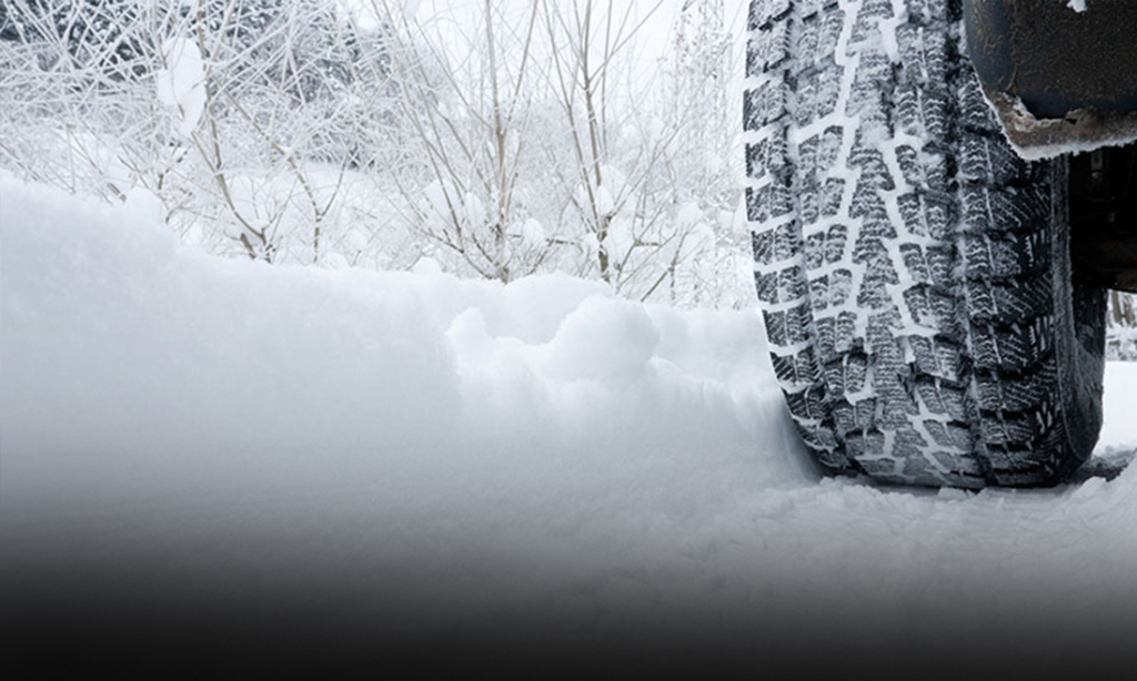 snow packed winter tires Hero