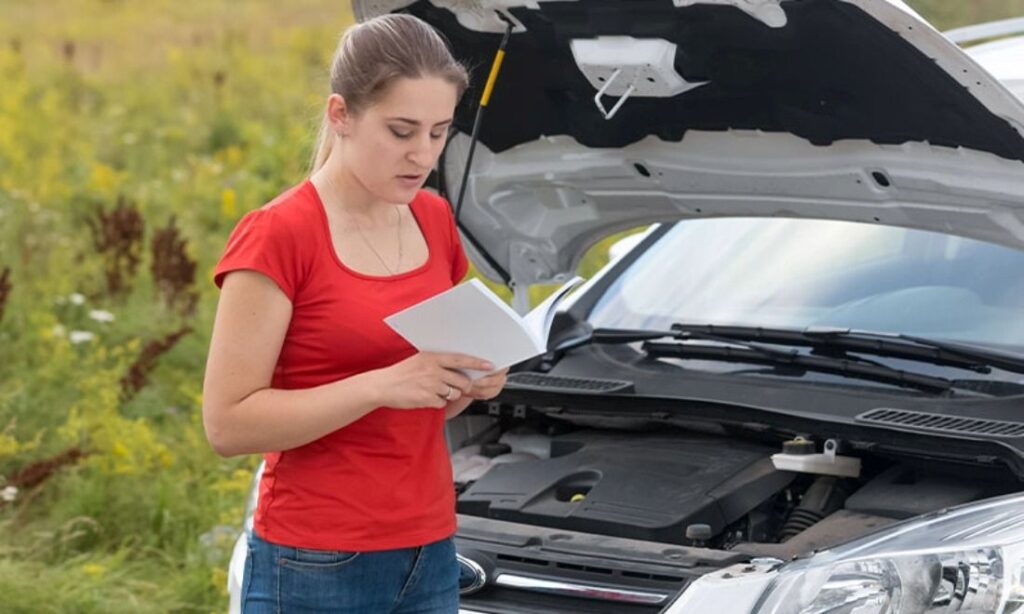 Woman reading owners manual